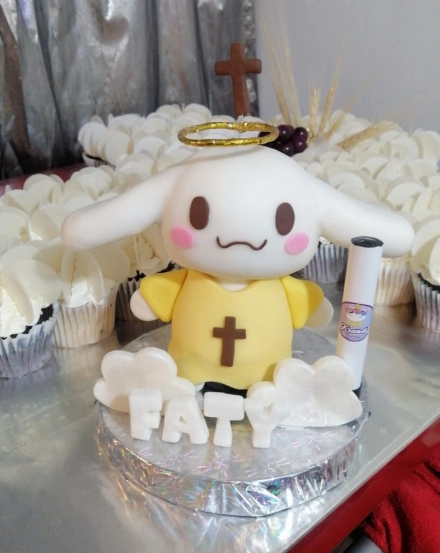 Vela figura modelada en fondant